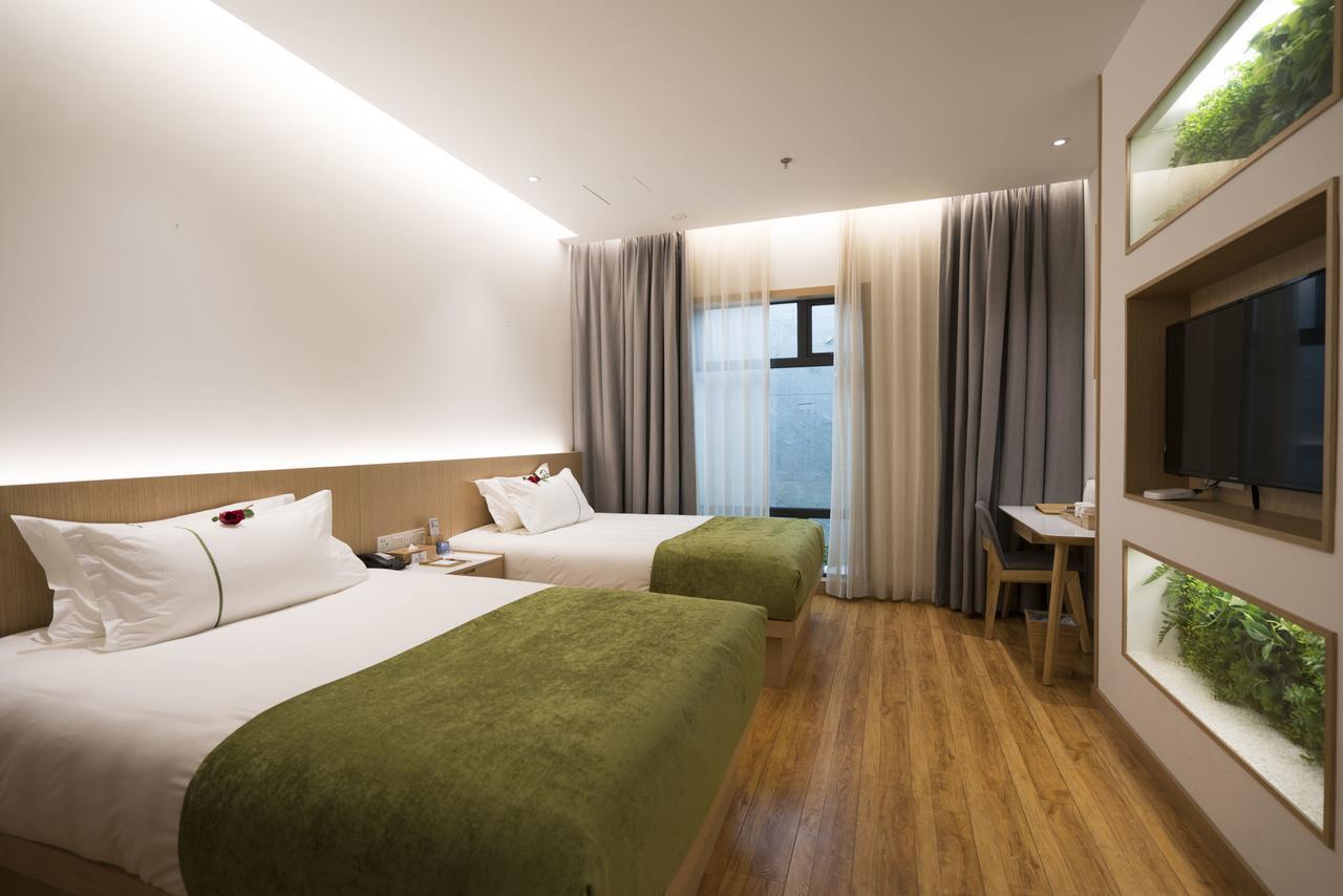 Bindun Langyi Hotel Yuzhong Bagian luar foto