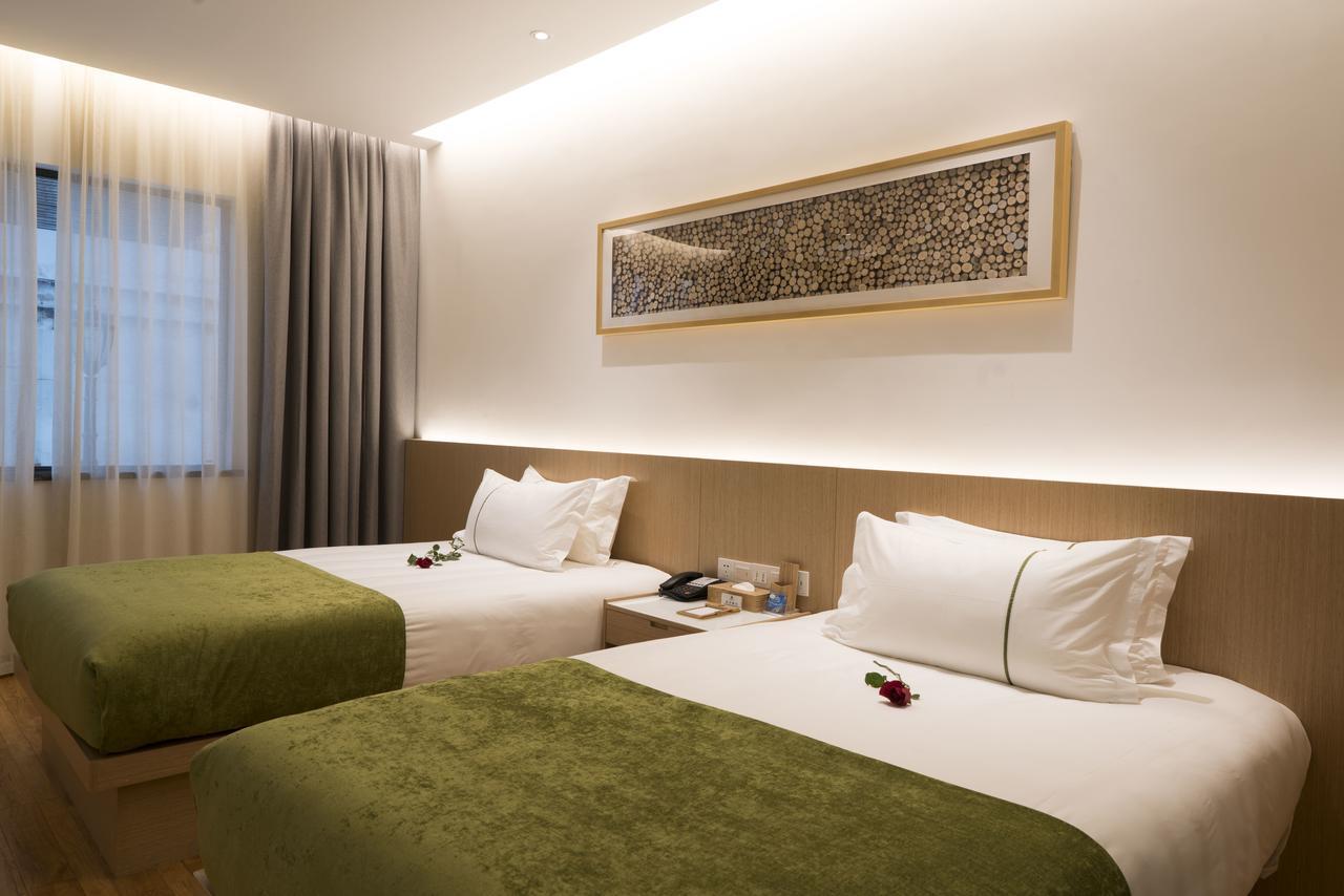 Bindun Langyi Hotel Yuzhong Bagian luar foto